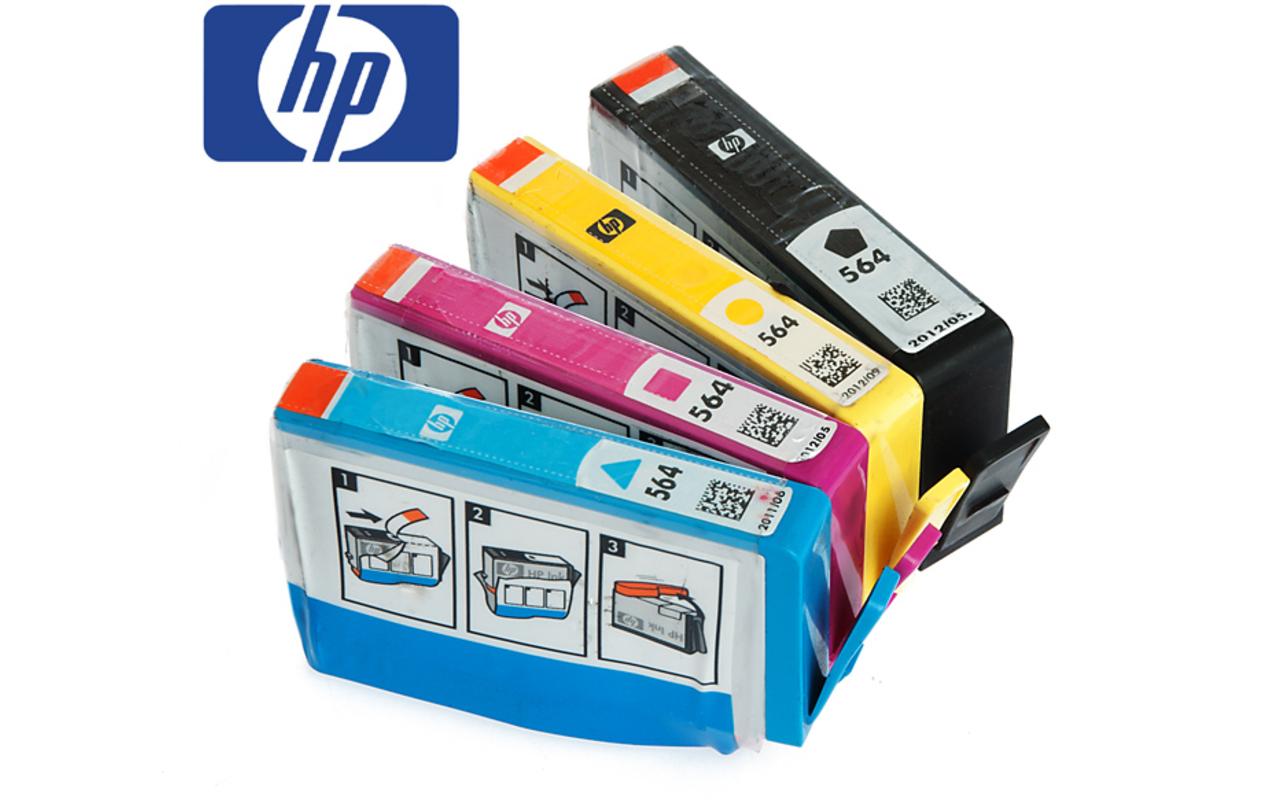 HP printer cartridges in blue, pink, yellow and black.